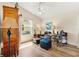 Cozy office with desk, chair, a ceiling fan and armoire, perfect for work or relaxation at 2167 Kerwood Loop, The Villages, FL 32162