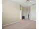 Spacious Primary bedroom with ceiling fan, neutral walls, and ample closet space at 24346 Amberleaf Ct, Leesburg, FL 34748