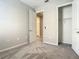 Comfortable bedroom with closet and view to attached bathroom at 2675 Ridgetop Ln, Clermont, FL 34711