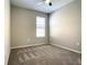 Bedroom with ceiling fan, neutral carpet, and natural light at 2675 Ridgetop Ln, Clermont, FL 34711