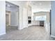 Open-concept kitchen featuring stainless steel appliances and modern cabinetry at 2675 Ridgetop Ln, Clermont, FL 34711