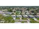 An aerial view highlights a beautiful community with lush greenery and a welcoming neighborhood atmosphere, marked with location pin at 3026 Myakka River Rd, Tavares, FL 32778