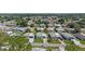 An aerial view showcases a beautiful community with lush greenery and a welcoming neighborhood atmosphere, marked with location pin at 3026 Myakka River Rd, Tavares, FL 32778
