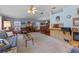 Expansive living room showcasing an open floor plan, neutral tones, and plenty of natural light at 3026 Myakka River Rd, Tavares, FL 32778