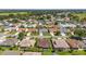Residential community with well-maintained lawns, diverse home styles, and a peaceful atmosphere at 3041 Batally Ct, The Villages, FL 32162