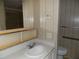 Bathroom featuring a classic sink vanity and standard fixtures at 323 Hawthorne Blvd, Leesburg, FL 34748