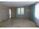 Cozy living room with ample space and natural light at 323 Hawthorne Blvd, Leesburg, FL 34748