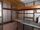 Workshop featuring shelving units and pegboard at 323 Hawthorne Blvd, Leesburg, FL 34748