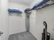 Walk-in closet space with shelves and storage at 3266 Woodridge Dr, The Villages, FL 32162