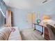 Bright office space with a sofa, desk, and view at 3266 Woodridge Dr, The Villages, FL 32162