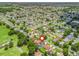 Aerial view of the neighborhood showing the community layout and surrounding green spaces at 3534 Auburndale Ave, The Villages, FL 32162