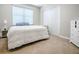 Bedroom features carpet, white walls, and a large window with blinds at 3775 Brantley Place Cir, Apopka, FL 32703