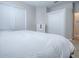 Bright bedroom with a full-size bed, dresser, and closet space at 3775 Brantley Place Cir, Apopka, FL 32703