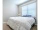 Bedroom features carpet, white walls, and a large window with blinds at 3775 Brantley Place Cir, Apopka, FL 32703