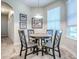 Cozy breakfast nook features a charming table set by a window at 3775 Brantley Place Cir, Apopka, FL 32703