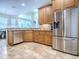 Spacious kitchen with stainless steel appliances, and ample counter space, perfect for cooking at 3775 Brantley Place Cir, Apopka, FL 32703