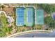 Community tennis courts with pickle ball court, basketball court, and scenic landscaping at 3842 Beacon Ridge Way, Clermont, FL 34711
