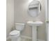 Powder room with pedestal sink at 3842 Beacon Ridge Way, Clermont, FL 34711