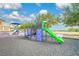 A colorful playground with slides, climbing structures, and soft rubber surface at 3842 Beacon Ridge Way, Clermont, FL 34711