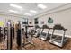 Bright fitness center with treadmills, weight machines, and plenty of natural light for a great workout at 3948 Serena Ln, Clermont, FL 34711