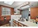Bathroom featuring a copper sink, wood accents and natural lighting at 41513 Aspen St, Eustis, FL 32736