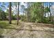This property boasts abundant space with trees, offering a serene natural backdrop at 41513 Aspen St, Eustis, FL 32736