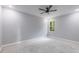 Bright bedroom featuring a window with view at 42191 Cashew St, Eustis, FL 32736