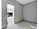 View into the garage area showing light and space for vehicles or storage at 42191 Cashew St, Eustis, FL 32736