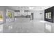 Bright, open kitchen with a large island, modern appliances, and sleek design elements at 42191 Cashew St, Eustis, FL 32736