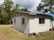 Shows the exterior of the house, but it is in disrepair and needs repairs at 447 E Desoto St, Clermont, FL 34711