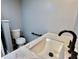 Close up of a sink and toilet at 519 Hawthorne Blvd, Leesburg, FL 34748