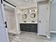Bathroom with double sink vanity and shower at 519 Hawthorne Blvd, Leesburg, FL 34748