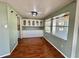 Cozy dining room with built-in cabinets and a sunny window view at 519 Hawthorne Blvd, Leesburg, FL 34748