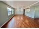 Open living space with hardwood floors and plenty of natural light at 519 Hawthorne Blvd, Leesburg, FL 34748