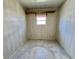An additional storage area featuring a window for natural light at 519 Hawthorne Blvd, Leesburg, FL 34748