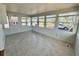 Bright sunroom with tile flooring and large windows, creating a relaxing space at 519 Hawthorne Blvd, Leesburg, FL 34748