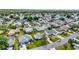 Charming single-story home with a well-maintained lawn and mature trees in a quiet, residential neighborhood at 529 Valencia Pl, Lady Lake, FL 32159