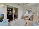 Bright sunroom with a view to the dining room and with access to the backyard at 529 Valencia Pl, Lady Lake, FL 32159