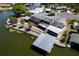 Lovely lakefront home with a large screened lanai, private dock, and well-maintained landscaping at 5339 Kings Ct, Fruitland Park, FL 34731