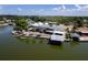 Tranquil waterfront home with boat dock offers peaceful lake living with serene surroundings at 5339 Kings Ct, Fruitland Park, FL 34731