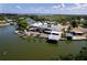 Picturesque lakefront home with boat dock, offering stunning views and waterside charm at 5339 Kings Ct, Fruitland Park, FL 34731