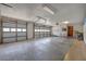 Large garage with two car-width doors, and lots of open space for vehicles and storage at 5339 Kings Ct, Fruitland Park, FL 34731