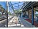 The covered patio offers a water view and ample space to enjoy the Florida weather year round at 5339 Kings Ct, Fruitland Park, FL 34731