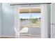 Balcony view overlooking a pond at 5492 Compass Pt, Oxford, FL 34484