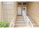 Inviting entrance with twin doors and a welcoming wreath decoration at 5492 Compass Pt, Oxford, FL 34484