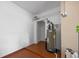 Clean utility room with water heater, and neutral paint at 5492 Compass Pt, Oxford, FL 34484