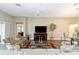 Comfortable living room showcasing tile floors, neutral walls and a ceiling fan at 560 Caputo Ct, The Villages, FL 32163