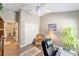 Cozy office space with natural light, closet, and wood-look tile flooring at 560 Caputo Ct, The Villages, FL 32163