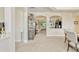 Open-concept dining room with sight lines to living spaces, enhancing the sense of flow at 5818 Greenbriar Loop, Leesburg, FL 34788