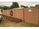 Fenced-in backyard with new landscaping, adding privacy and curb appeal to the property at 604 N Old Wire Rd, Wildwood, FL 34785